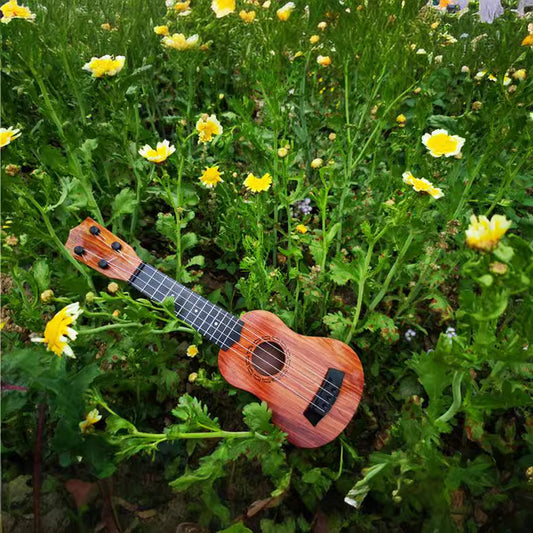 Ukulele de plástico